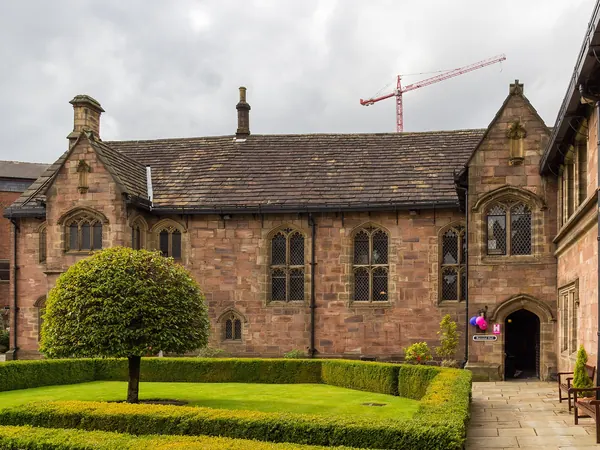Sandstone courtyard buildings of Chetham's Library on Long Millgate, Manchester