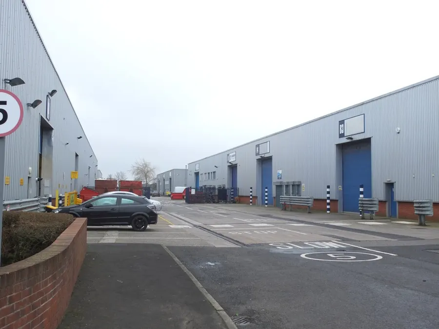 Steel-clad warehouse units on Hazlemere Industrial Estate, Land Gate, beside junction 25 of the M6 in the Wigan borough